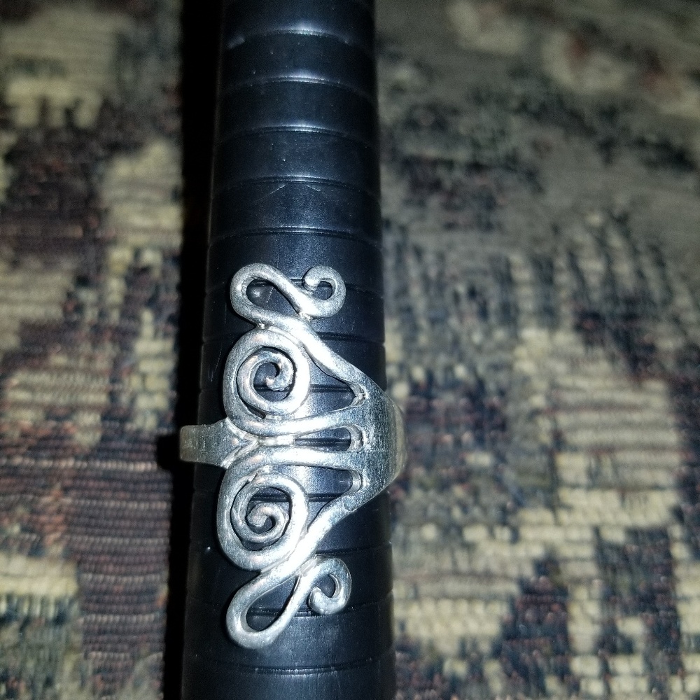 Long swirly fork ring size 8 Sterling silver.
